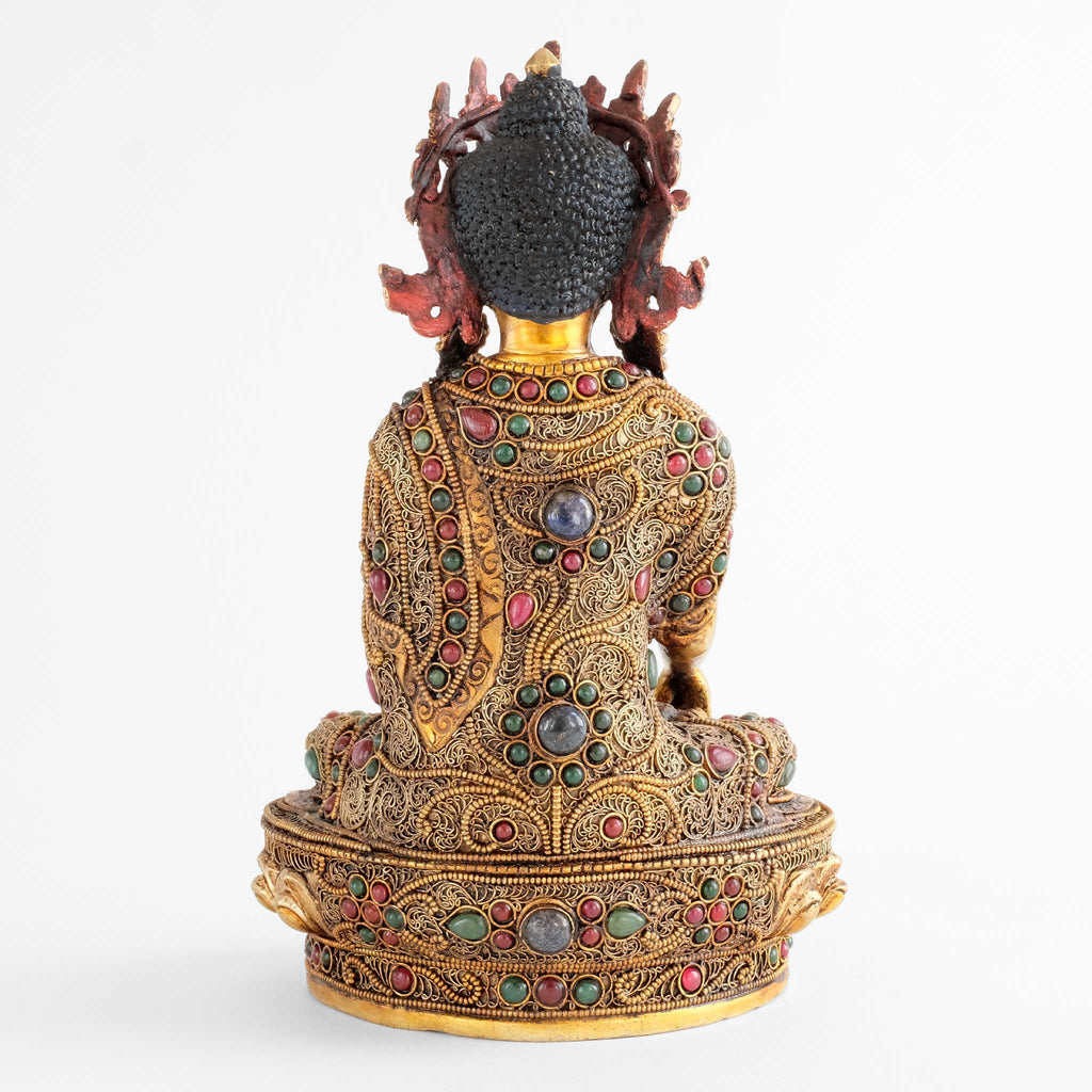 Rear side of Akshobhya Buddha statue, the filigree is applied all around so that the statue can be presented as a free-standing piece.