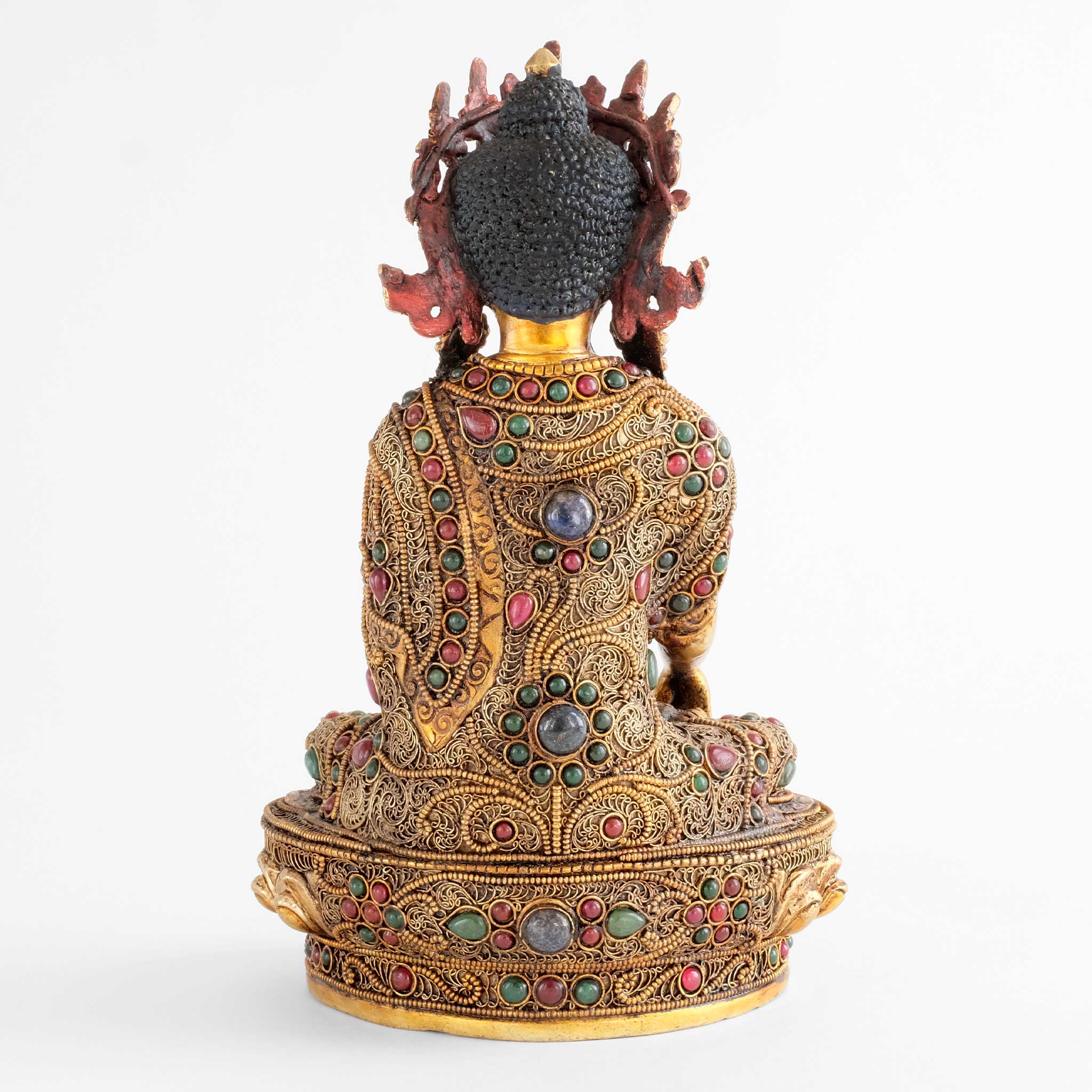 Rear side of Akshobhya Buddha statue, the filigree is applied all around so that the statue can be presented as a free-standing piece.