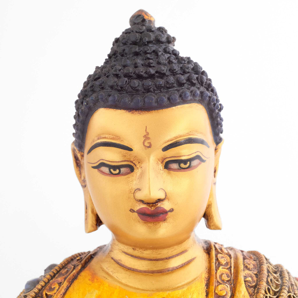 Bhaisajyaguru, Medizinuddha, das Gesicht ist in Gold gefasst.