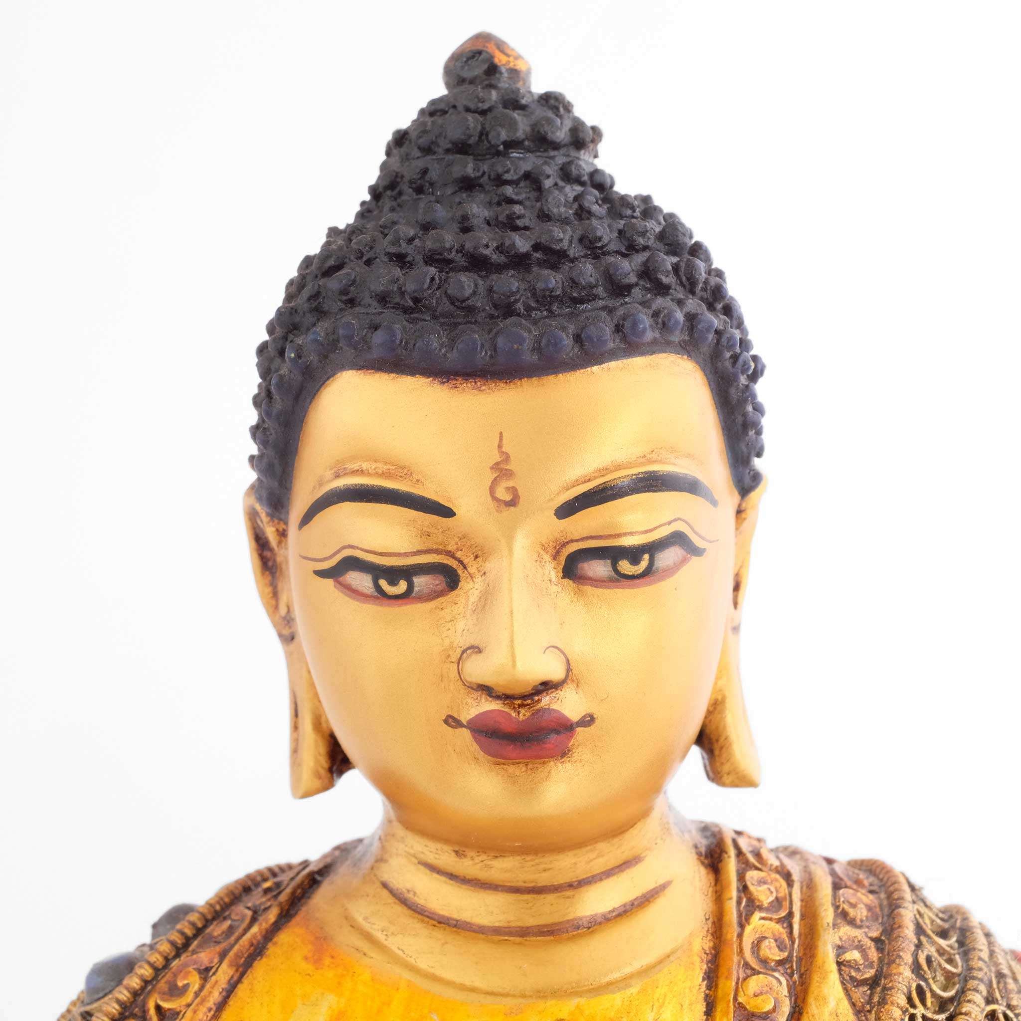 Bhaisajyaguru, Medizinuddha, das Gesicht ist in Gold gefasst.