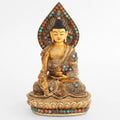 Medizin Buddha, Bhaisajyaguru mit Filigran verziert, versilbert und vergoldet, besetzt mit Türkis, Koralle, Lapislazuli.