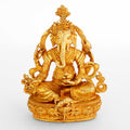 Kleine goldene Ganesha Statue auf einem Lotus Sockel. 4-armige Darstellung.