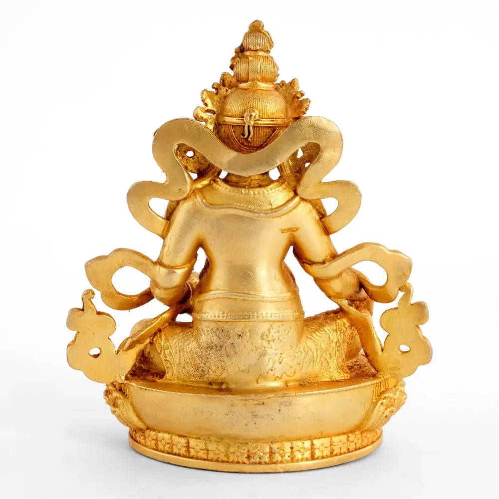 Rückannsicht, goldene Statue der Wohltätigkeits-Gottheit.