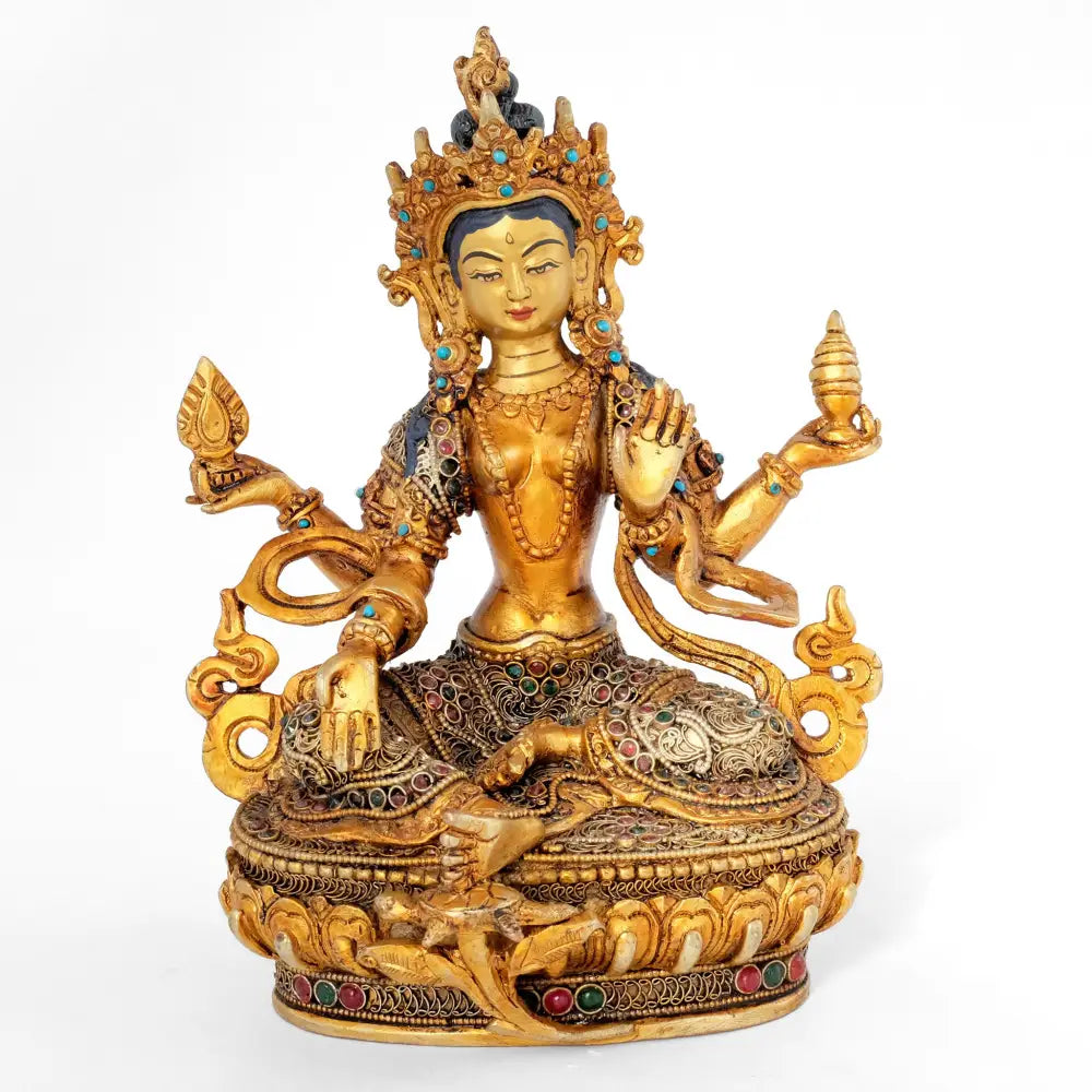 Lakshmi, vergoldete Statue mit versilbertem Filigran und farbigen Steinen.
