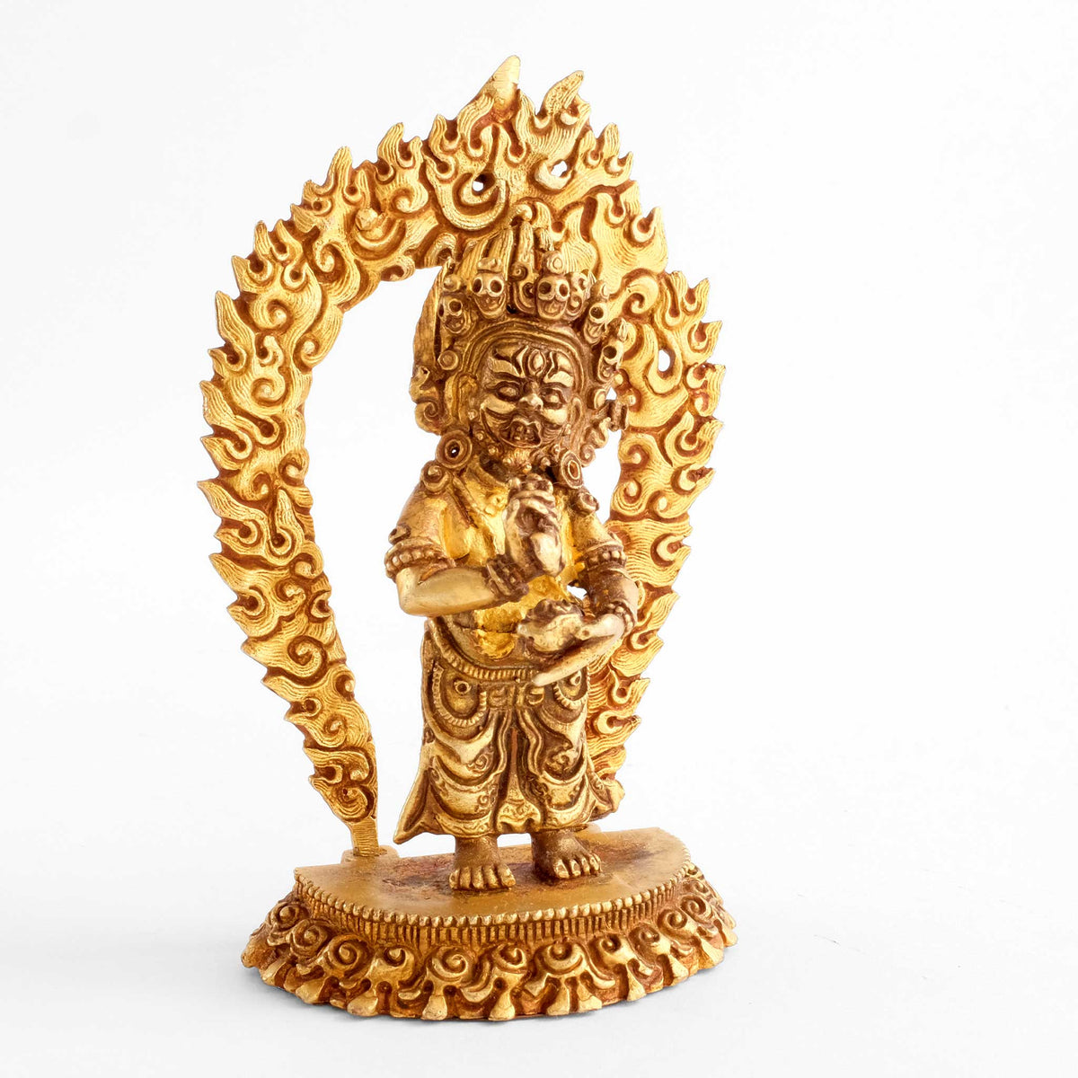 Kleine vergoldete Mahakala Statue, detaillierter Kupferguss. Seitenansicht der Figur.