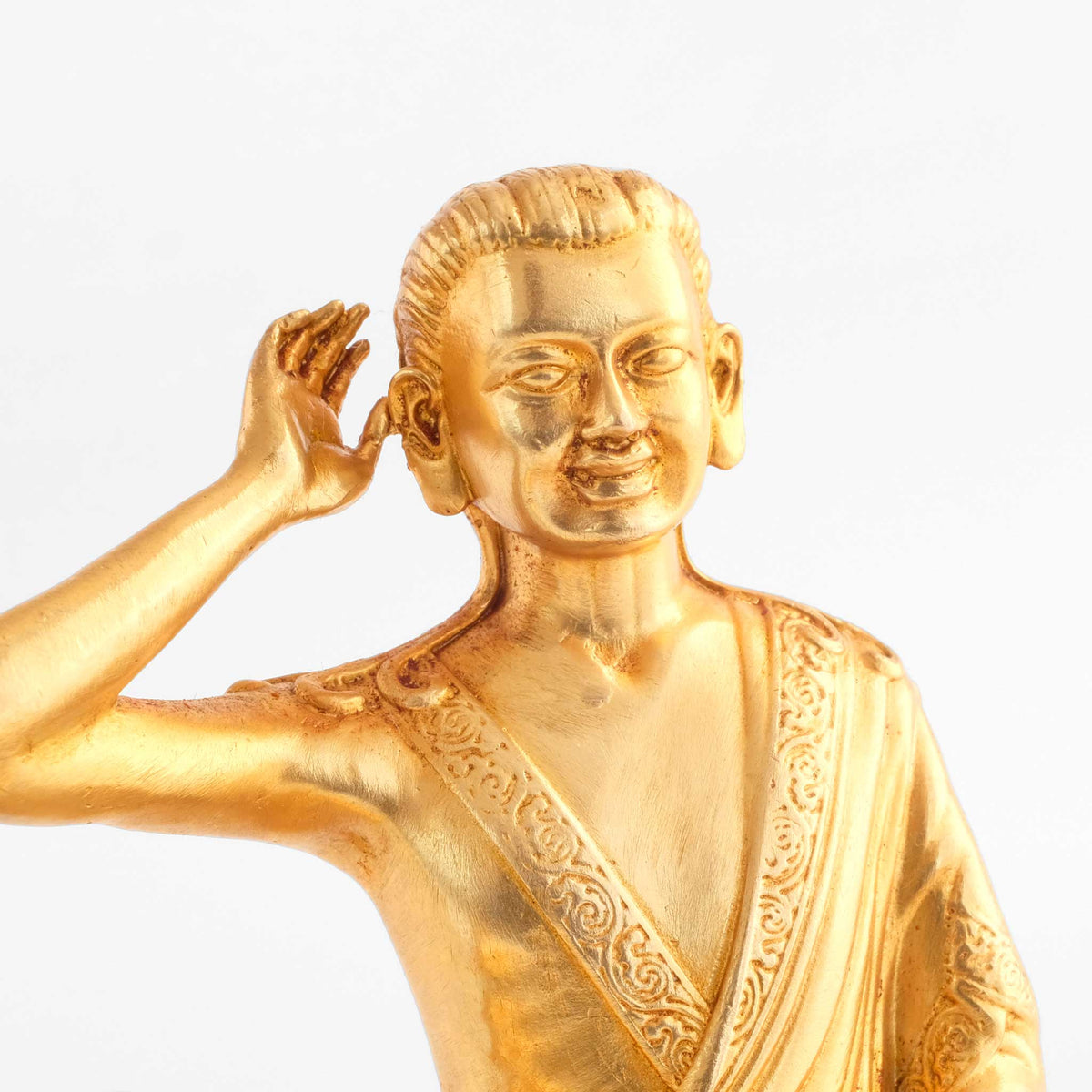 Jetsun Milarepa Figur, kleine vergoldete Figur, detaillierter Kupferguss. Detailaufnahme von Gesicht und Geste.