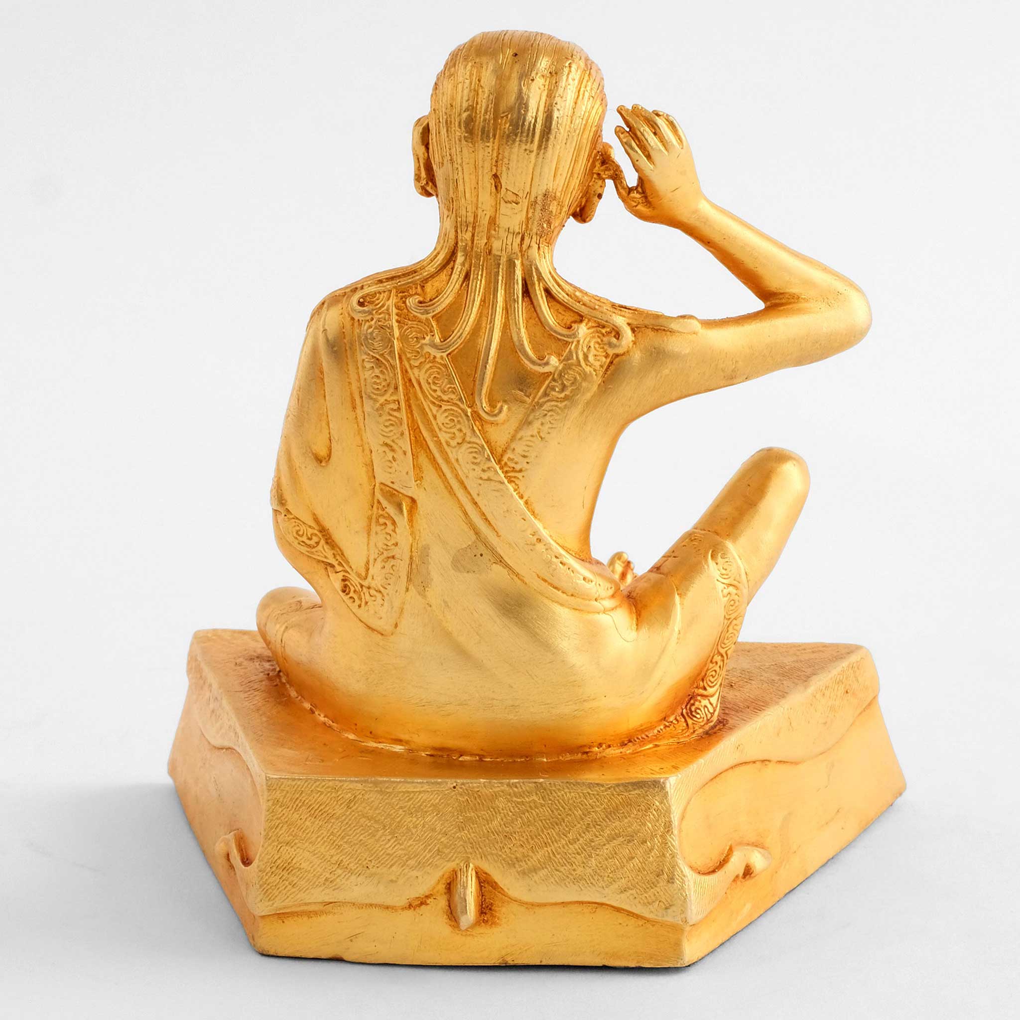 Milarepa Statue, Rückenansicht. Vergoldete buddhistische Figur.
