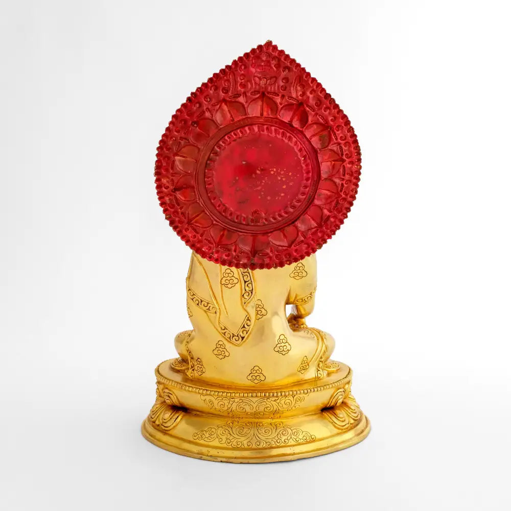 Goldene Buddha-Statue die Rückseite des Heiligenscheins hat einen roten Farbauftrag.