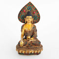 Shakyamuni Buddha Statue mit Aureole, im Lotussitz auf Lotus-Sockel, mit Filigran und farbigen Steinen verziert.